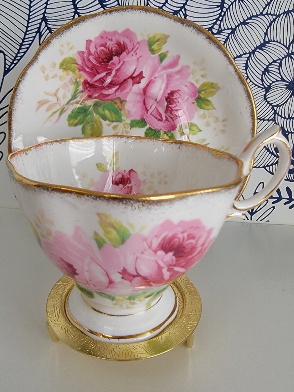 Royal Albert teacup and saucer set: American Beauty; pink roses gold trim